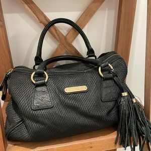 Cynthia Rowley black leather embossed lizard bowler bag with cross body strap.